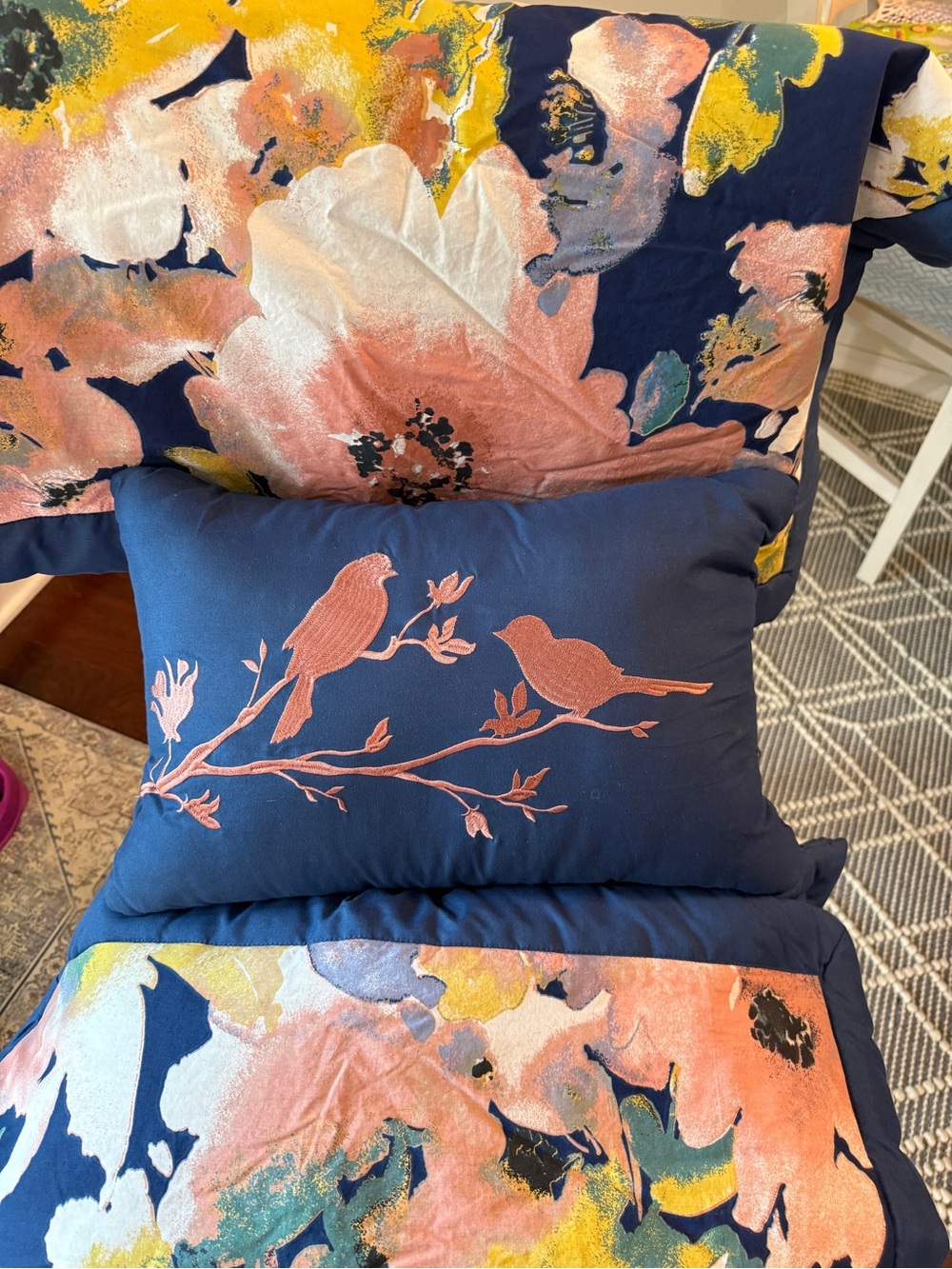 Lush decor Navy Blue and floral queen pillow case set with decorative pillow.